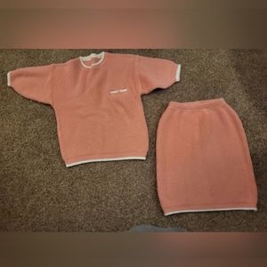 knitted top and skirt, size small. Pink/peach color